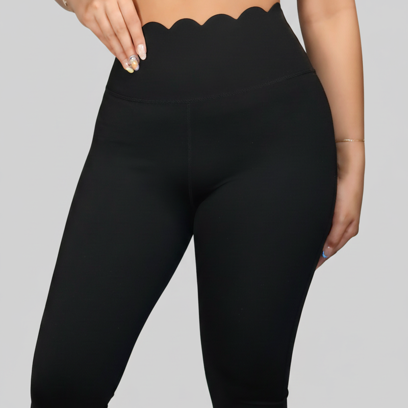 Professional black leggings on grey background