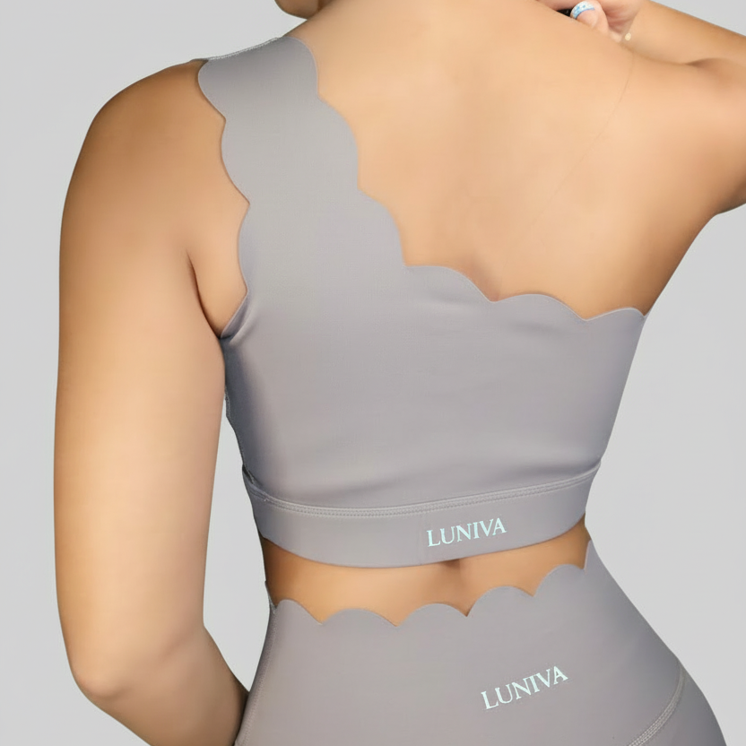 Professional grey LUNIVA activewear back detail on grey background
